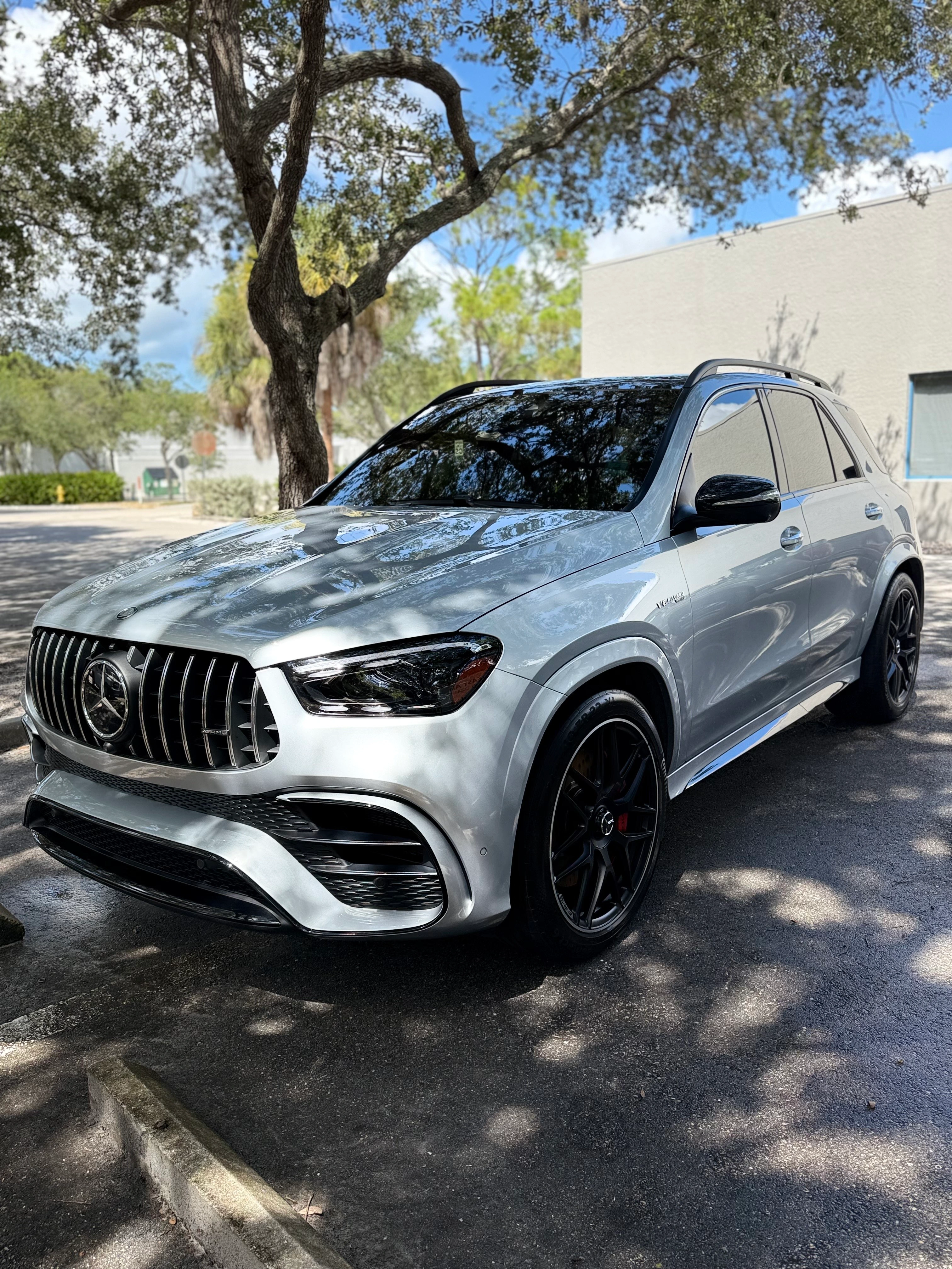 Detailed silver SUV with deep gloss exterior finish